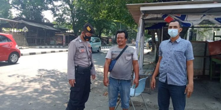 Seltim Polres Ciko Himbau warga dengan PPKM