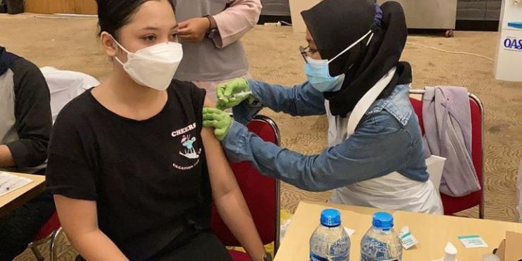 Polres Metro Bekasi Kota Ikut Sertakan Mahasiswa dalam Kegiatan Gebyar Vaksinasi Merdeka